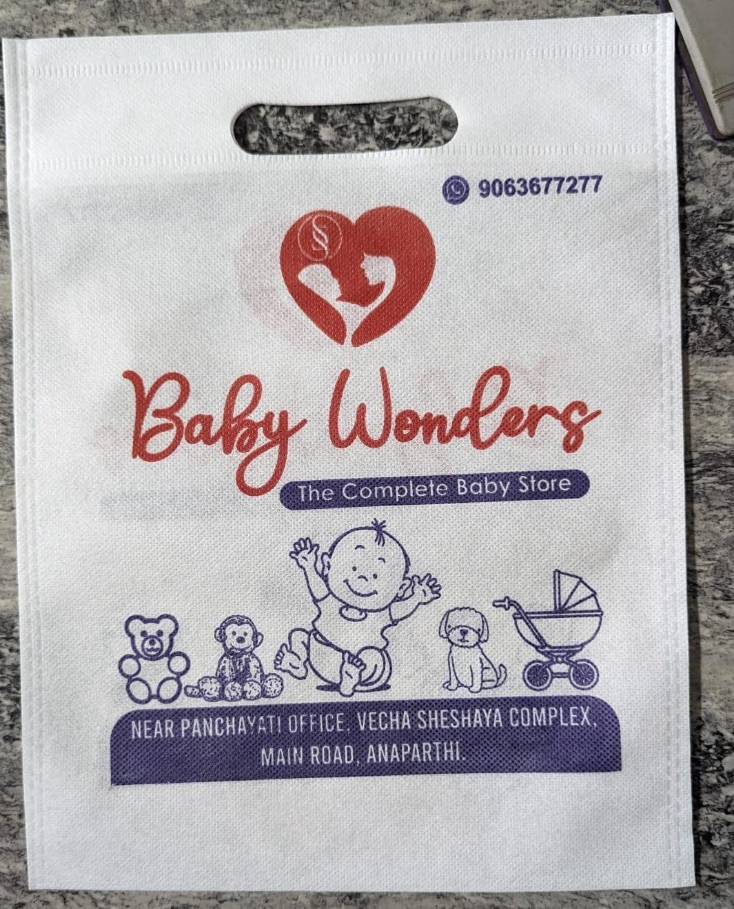 Non-woven D-cut bag for Baby Wonders retail store in Anaparthi